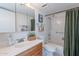 Clean bathroom with shower/tub combo and vanity at 7820 E Camelback Rd # 209, Scottsdale, AZ 85251