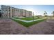 Relaxing courtyard with artificial turf and building view at 7820 E Camelback Rd # 209, Scottsdale, AZ 85251