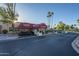 Community gatehouse with golf cart parking at 7820 E Camelback Rd # 209, Scottsdale, AZ 85251