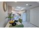 Well-equipped kitchen with white cabinetry, modern appliances, and tile flooring at 7820 E Camelback Rd # 209, Scottsdale, AZ 85251
