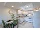 Clean kitchen with white cabinetry and modern appliances at 7820 E Camelback Rd # 209, Scottsdale, AZ 85251