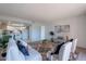 Open living space with a view into the kitchen and access to a balcony at 7820 E Camelback Rd # 209, Scottsdale, AZ 85251