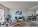 Bright living room with comfy seating and a stylish area rug at 7820 E Camelback Rd # 209, Scottsdale, AZ 85251
