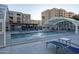 Refreshing community pool with covered seating and lounge chairs at 7820 E Camelback Rd # 209, Scottsdale, AZ 85251