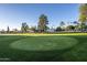 Putting green with surrounding landscaping at 7820 E Camelback Rd # 209, Scottsdale, AZ 85251