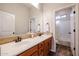 Bathroom with double sinks and a separate shower and tub at 25995 N 85Th Dr, Peoria, AZ 85383