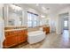 Elegant bathroom with soaking tub and double vanities at 25995 N 85Th Dr, Peoria, AZ 85383