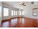 Bright bedroom with hardwood floors and large windows at 25995 N 85Th Dr, Peoria, AZ 85383