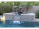 Close-up of a unique stone fountain with a cascading waterfall at 25995 N 85Th Dr, Peoria, AZ 85383