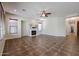 Spacious living room with tile floors and a fireplace at 25995 N 85Th Dr, Peoria, AZ 85383