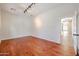 Bright office space with hardwood floors and track lighting at 25995 N 85Th Dr, Peoria, AZ 85383
