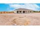 Rear view of house with covered patio at 3311 S 197Th Dr, Buckeye, AZ 85326