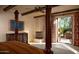 Spacious Primary bedroom with fireplace, private access to patio, and stunning views at 10040 E Happy Valley Rd # 504, Scottsdale, AZ 85255