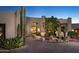 Stunning Southwestern-style home with a landscaped front yard and desert plants at 10040 E Happy Valley Rd # 504, Scottsdale, AZ 85255