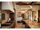 Gourmet kitchen boasts granite countertops and custom cabinetry at 10040 E Happy Valley Rd # 504, Scottsdale, AZ 85255
