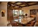 Spacious kitchen with granite island and custom wooden cabinets at 10040 E Happy Valley Rd # 504, Scottsdale, AZ 85255