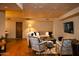 Spacious living room showcasing comfortable seating and hardwood floors at 10040 E Happy Valley Rd # 504, Scottsdale, AZ 85255