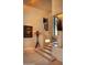 Ornate staircase with unique tiled accents and artwork at 10040 E Happy Valley Rd # 504, Scottsdale, AZ 85255