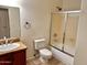 Bathroom with tub, shower, and single vanity at 1445 E Broadway Rd # 120, Tempe, AZ 85282