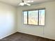 Bedroom with window and ceiling fan at 1445 E Broadway Rd # 120, Tempe, AZ 85282
