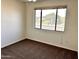 Bedroom with window and carpet flooring at 1445 E Broadway Rd # 120, Tempe, AZ 85282