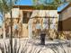 Townhome entrance with grill and landscaping at 1445 E Broadway Rd # 120, Tempe, AZ 85282
