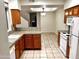 Kitchen with granite countertops and wood cabinets at 1445 E Broadway Rd # 120, Tempe, AZ 85282