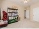Bedroom with shelving unit and closet at 25714 N 70Th Ln, Peoria, AZ 85383