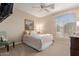 Bedroom with a queen bed and nice window at 25714 N 70Th Ln, Peoria, AZ 85383