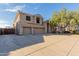 Two-story house with three-car garage and gated driveway at 25714 N 70Th Ln, Peoria, AZ 85383