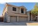 Two-story house with three-car garage and front yard at 25714 N 70Th Ln, Peoria, AZ 85383