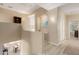 Upstairs hallway with light wood floors at 25714 N 70Th Ln, Peoria, AZ 85383