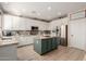 Spacious kitchen with granite countertops, island, and stainless steel appliances at 25714 N 70Th Ln, Peoria, AZ 85383