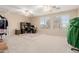 Home office with built-in desk and ample natural light at 25714 N 70Th Ln, Peoria, AZ 85383