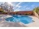 Stunning kidney-shaped pool with a built-in barbecue at 25714 N 70Th Ln, Peoria, AZ 85383