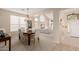 Bright dining room with a charming table and chairs at 25714 N 70Th Ln, Peoria, AZ 85383