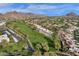 Community overview showing homes near a golf course and mountain views at 2626 E Arizona Biltmore Cir # 40, Phoenix, AZ 85016