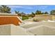 View from rooftop shows Spanish tile roofs and mountain views at 2626 E Arizona Biltmore Cir # 40, Phoenix, AZ 85016