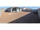 Spacious backyard with block wall and covered patio at 39995 W Bravo Dr, Maricopa, AZ 85138