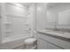 Clean bathroom with granite countertop and bathtub at 39995 W Bravo Dr, Maricopa, AZ 85138