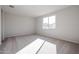 Spacious bedroom with carpet and a window providing natural light at 39995 W Bravo Dr, Maricopa, AZ 85138