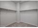 Large walk-in closet featuring ample shelving and hanging space at 39995 W Bravo Dr, Maricopa, AZ 85138