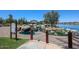 Landscaped water features with waterfall and seating area at 39995 W Bravo Dr, Maricopa, AZ 85138