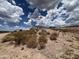 New construction home on a hillside lot with desert landscape at 4237 E 4Th Ave, Apache Junction, AZ 85119