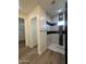 Bathroom with a shower, toilet, and a hallway leading to a closet at 4237 E 4Th Ave, Apache Junction, AZ 85119