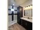 Modern bathroom with a large walk-in shower, double vanity, and granite countertop at 4237 E 4Th Ave, Apache Junction, AZ 85119