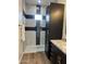 Contemporary bathroom with black and white tile shower and walk-in shower at 4237 E 4Th Ave, Apache Junction, AZ 85119