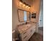 Modern bathroom with granite countertops and updated fixtures at 4237 E 4Th Ave, Apache Junction, AZ 85119