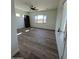 Bright bedroom featuring wood-look floors and ample natural light at 4237 E 4Th Ave, Apache Junction, AZ 85119