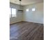 Spacious dining area with hardwood floors and large windows at 4237 E 4Th Ave, Apache Junction, AZ 85119